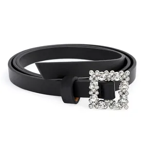 Detailed view of women's black PU leather thin belt featuring a sparkly rhinestone square buckle.