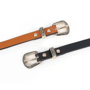 Retro women's PU leather thin belt with decorative metallic carved buckle detail for jeans.