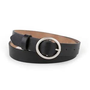 Detail view of stylish black women leather belt with silver round metal buckle casual daily.