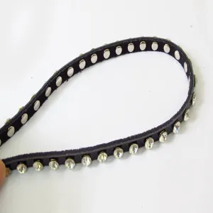 Women's black leather rhinestone thin belt detail shot, sparkling crystal waist chain.