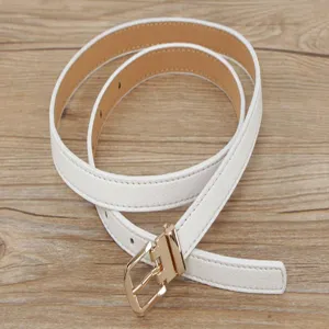 Close-up of a minimalist white thin women belt featuring a sleek golden pin buckle detail.