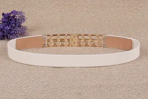 Detailed view of the elegant white elastic waist belt featuring a hollow gold-toned metal buckle.