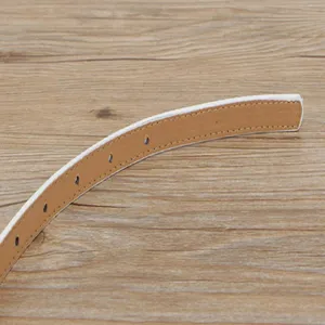 Close-up detail of the thin white women belt, showing neat stitching and inner lining texture.