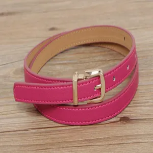 Pink leather belt for women, elegant thin belt with stylish gold buckle detail for daily wear.