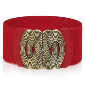 Detailed closeup of the retro red wide elastic waist belt with ornate vintage brass metal buckle.