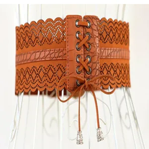 Cintura larga allacciata arancione da donna, corsetto in ecopelle traforata per vestito.