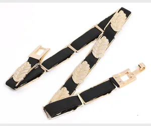 Women fashion elastic metal leaf skinny belt for dress, elegant gold decorative accessory.