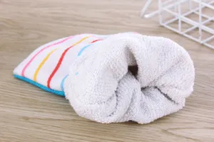 Double-sided exfoliating bath mitt with soft terry towel texture for deep body cleansing.