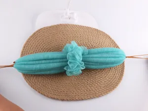 Puf de ducha de malla larga turquesa y esponja de baño exfoliante para la limpieza corporal diaria