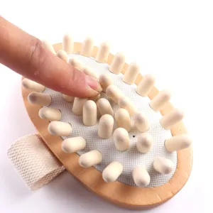 Wooden body massage brush detail showing soft wooden bristles and comfortable cushion base.