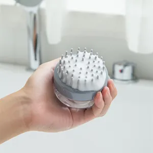 Brosse de massage pour cuir chevelu en silicone liquide pour shampooing confortable et nettoyage.