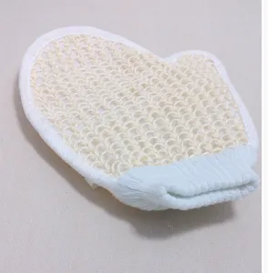 Sisal bath exfoliating mitt detail close-up, elastic wrist cuff and thumb design for deep cleaning.