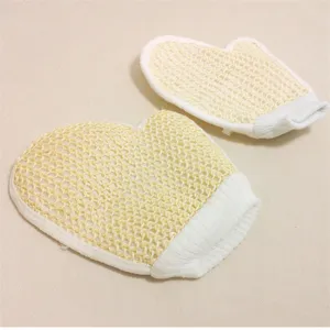 Detailed view of exfoliating bath mitts with mesh texture and elastic cuff for daily spa care.