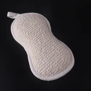 Beige peanut shape bath sponge scrubber with hemp texture and hanging loop for daily body cleaning.