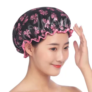 Doppellagige wasserdichte Duschhaube mit rosa Schleifenprint, elastischer Rand für Haarpflege.