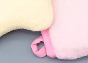 Soft baby bath sponge detail showing plush textured fabric and hanging loop design