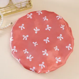 Waterproof satin shower cap for women, double layer hair cap with cute bow print design for bath.