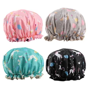 Waterproof double layer shower cap with cute cartoon unicorn print and elastic lace edge.