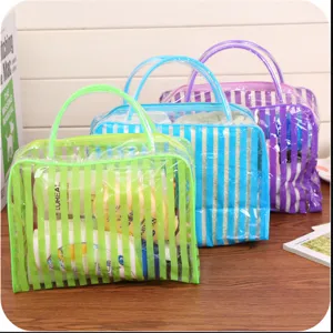 Large transparent PVC waterproof toiletry bag, portable striped travel makeup storage bag.