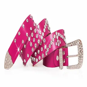 Hot pink rhinestone leather belt with glittering crystals and sparkly buckle details.