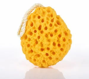 Soft yellow honeycomb bath sponge with hanging cord for deep body cleansing and daily shower use.