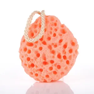 Pink honeycomb wood pulp bath sponge with hanging cord for deep skin cleaning and daily body wash.