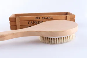 Long handled wooden bath brush with natural bristles for body cleaning and back scrubbing.