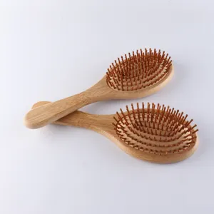 Spazzola per capelli naturale in bambù con cuscino d'aria e setole da massaggio quotidiano.