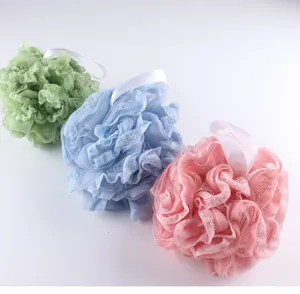 Set of 3 large lace ruffle bath sponge puffs with hanging ribbon for daily shower and bathing.