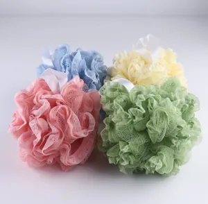 Detailed close-up view of colorful bath sponges with hanging strings for easy shower use.