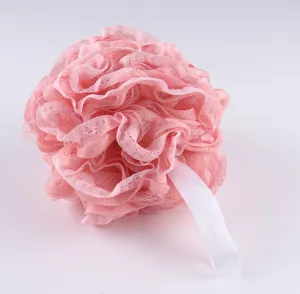 Pink lace ruffle bath sponge detail, soft mesh texture, convenient hanging ribbon for shower.