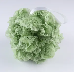 Soft green mesh bath sponge with white ribbon for daily shower and exfoliating body wash.