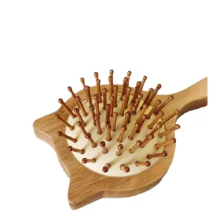 Cute cartoon cat wooden hairbrush with bamboo air cushion and anti static design for kids and girls.