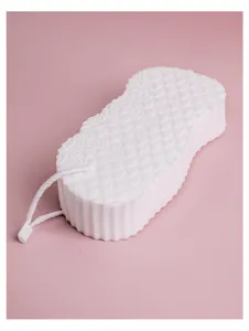 Soft exfoliating bath sponge with textured fish scales for gentle baby skin cleaning.