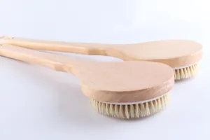 Natural wooden long handle body bath brush detail view, soft bristle for skin care.
