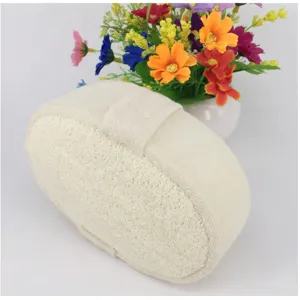 Natural plant fiber loofah bath sponge detail showcasing the exfoliating texture and hand strap.
