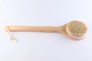 Long handled wooden bath brush detail, natural bristle body scrubber with hanging rope design.