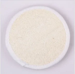 Natural loofah bath sponge circle scrubber with white cloth edge for gentle body exfoliating skin.
