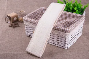 Natural loofah back scrubber exfoliating bath sponge with fabric trim for body skin care detail