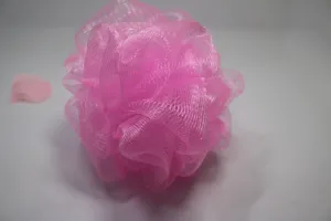 Pink mesh bath sponge detail, fluffy loofah puff for daily shower and body cleaning.