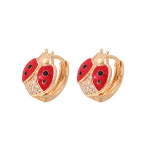 Orecchini a cerchio coccinella smalto rosso dorati simpatici gioielli geometrici donna
