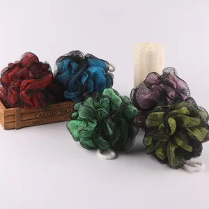 Detailed view of colorful mesh bath sponge shower puffs set, soft texture for body scrubbing.