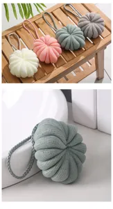 Soft mesh bath sponge with hanging rope, pumpkin shaped shower puff for daily body cleaning.
