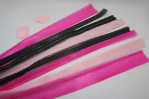 Colorful mesh netting strips for bath sponge making, soft exfoliating loofah material.