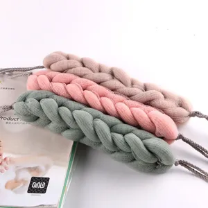 Detailed view of colorful braided long bath sponge mesh scrubbers for comfortable back cleaning.