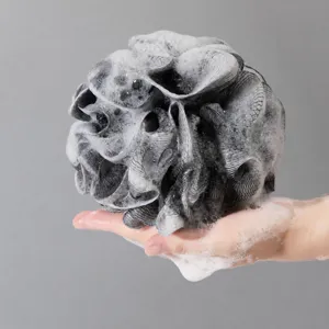 Soft mesh bath sponge for shower body washing, rich lather shower puff grey color.