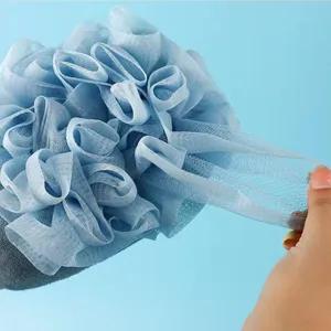 Blue exfoliating bath sponge and mesh scrubbing glove double-sided body cleaner tool