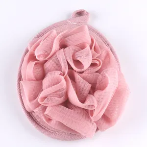 Close-up van zachte roze mesh badspons textuur, met ultra-dichte fijne bubbeldetails.