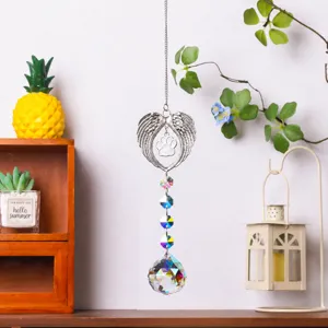 Crystal suncatcher hanging decor with angel wings and paw print for garden and home window display.