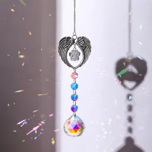 Crystal suncatcher hanging ornament with angel wings and paw print for garden window decor.